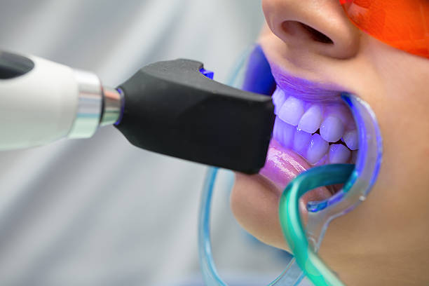 a person undergoing professional teeth whitening